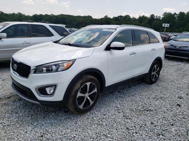 KIA SORENTO EX 2016 with VIN 5XYPH4A14GG137386 - Photo from auction