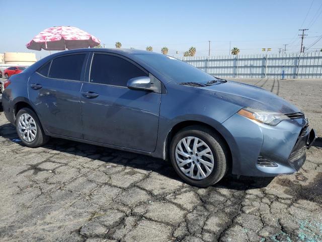 Photo 4 from auction – 2017 TOYOTA COROLLA L with VIN 5YFBURHE9HP694450