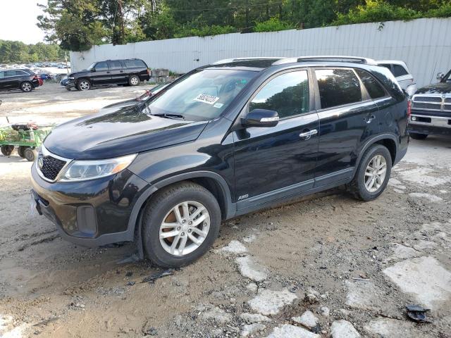 KIA SORENTO LX 2015 with VIN 5XYKTDA72FG591860 - Photo from auction