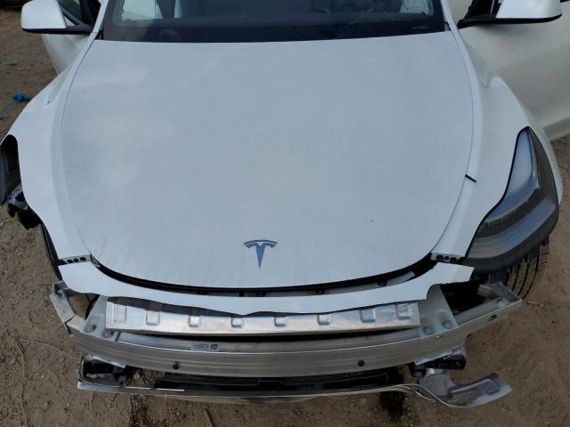 Photo 12 from auction – 2023 TESLA MODEL Y with VIN 7SAYGDEE1PA114000