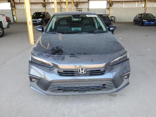 Photo 5 from auction – 2023 HONDA CIVIC TOUR with VIN 2HGFE1F96PH306909