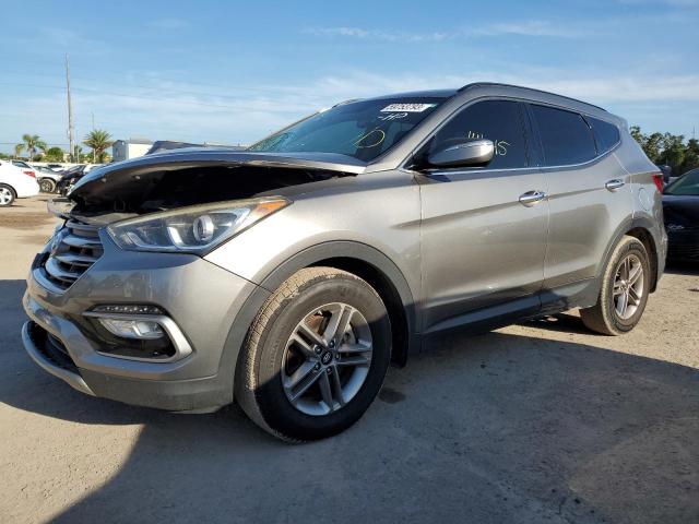 HYUNDAI SANTA FE S 2018 with VIN 5NMZU3LB5JH062795 - Photo from auction