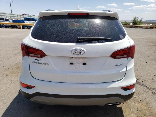 Photo 6 from auction – 2018 HYUNDAI SANTA FE S with VIN 5NMZU3LB1JH107490