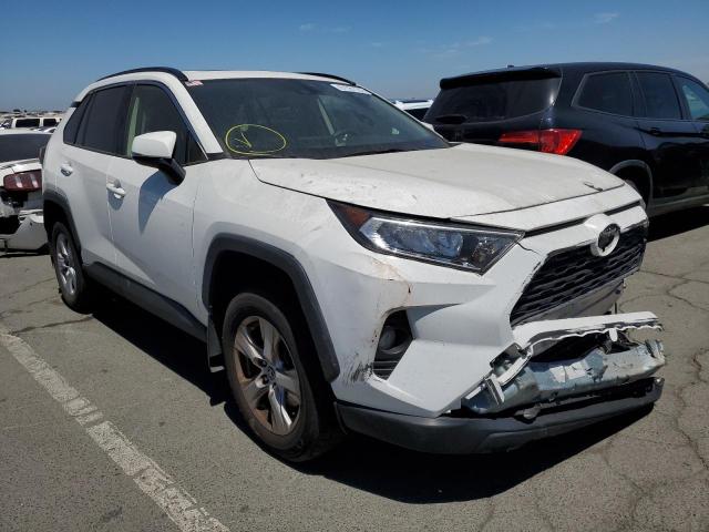 Photo 4 from auction – 2019 TOYOTA RAV4 XLE with VIN JTMW1RFV4KD026563