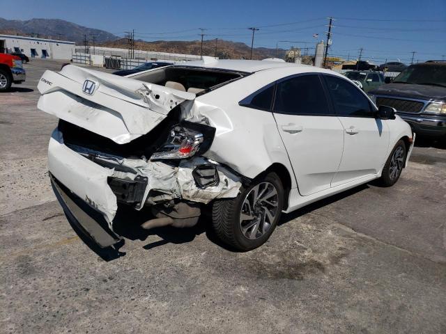Photo 3 from auction – 2018 HONDA CIVIC EX with VIN 19XFC2F87JE208332