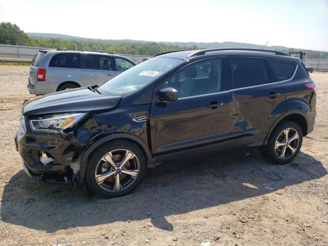 FORD ESCAPE SE 2017 with VIN 1FMCU9GD4HUC60951 - Photo from auction