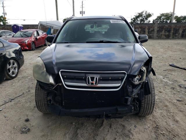 Photo 5 from auction – 2005 HONDA CR-V LX with VIN SHSRD68595U309191