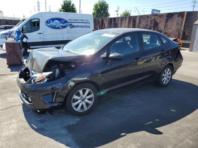 FORD FIESTA SE 2012 with VIN 3FADP4BJ5CM218923 - Photo from auction