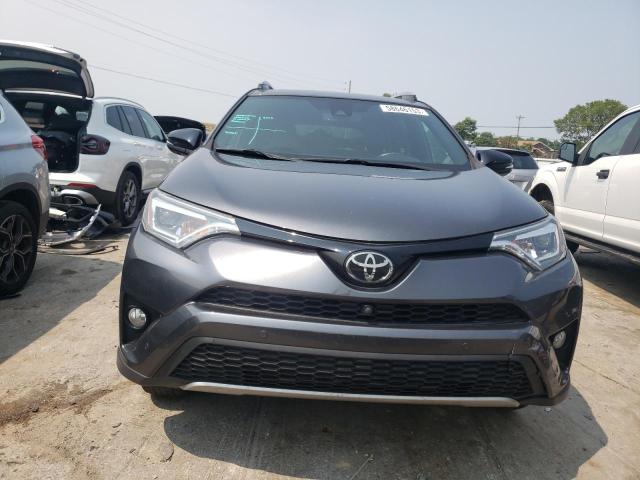 Photo 5 from auction – 2018 TOYOTA RAV4 SE with VIN JTMJFREV6JD236612
