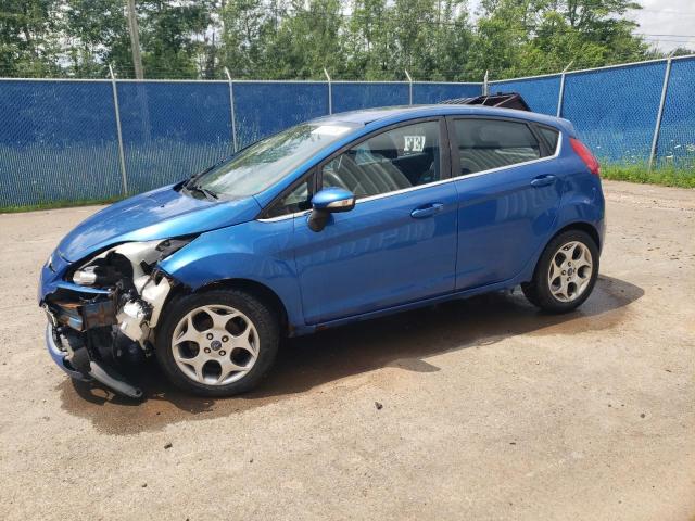 FORD FIESTA SES 2011 with VIN 3FADP4FJ2BM224705 - Photo from auction