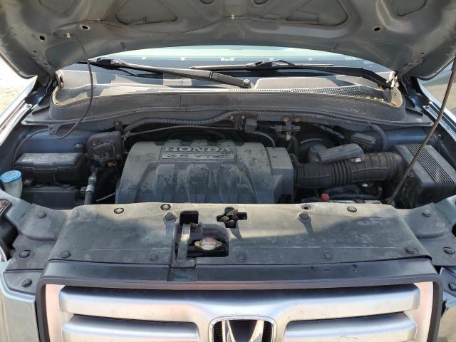 Photo 12 from auction – 2006 HONDA PILOT EX with VIN 2HKYF18586H555099