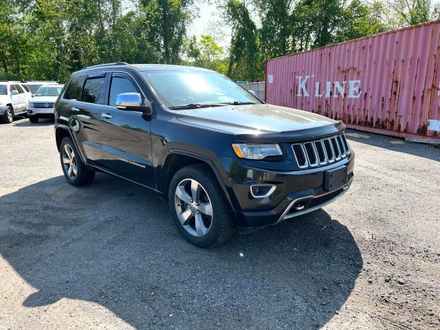 JEEP GRAND CHER 2015 with VIN 1C4RJFCM3FC878003 - Photo from auction
