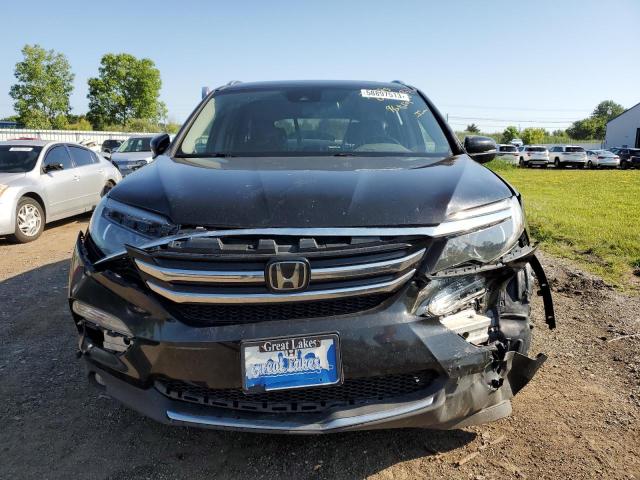 Photo 5 from auction – 2018 HONDA PILOT TOUR with VIN 5FNYF6H98JB009409