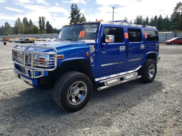 HUMMER H2 2004 with VIN 5GRGN23UX4H105421 - Photo from auction
