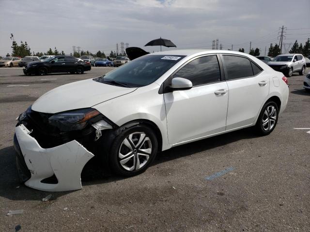 TOYOTA COROLLA L 2018 with VIN 5YFBURHE2JP748306 - Photo from auction