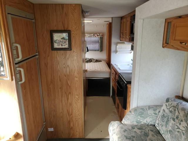Photo 6 from auction – 1999 FORD ECONOLINE with VIN 1FDXE40S2XHA35610
