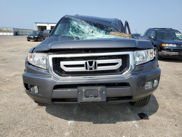 Photo 5 from auction – 2010 HONDA RIDGELINE with VIN 5FPYK1F53AB011011