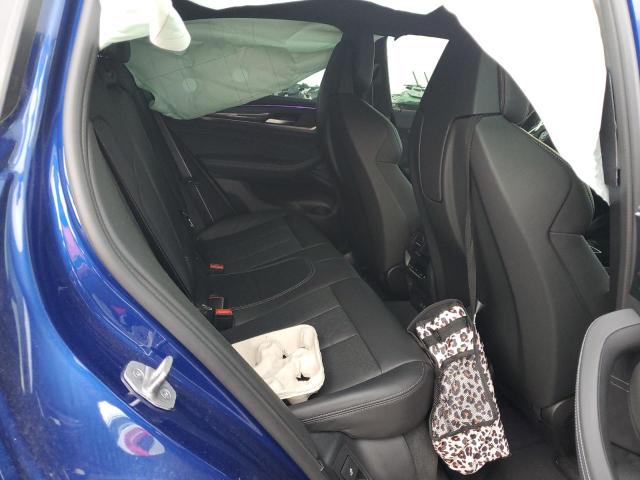 Photo 10 from auction – 2022 BMW X4 M with VIN 5YM23EC0XN9J15742