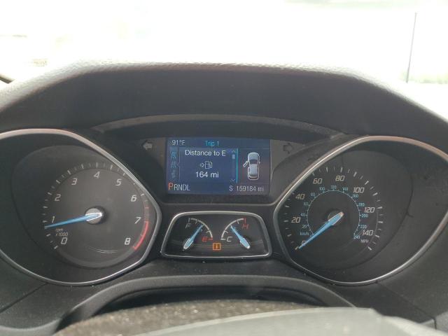 Photo 9 from auction – 2014 FORD FOCUS with VIN 1FADP3F24EL347527