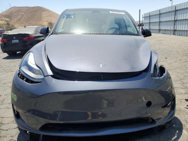 Photo 5 from auction – 2023 TESLA MODEL Y with VIN 7SAYGAEEXPF660554