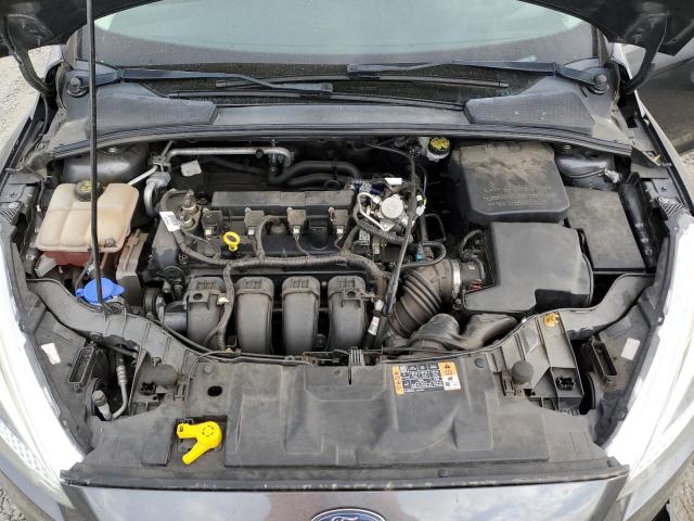 Photo 11 from auction – 2016 FORD FOCUS SE with VIN 1FADP3F24GL351578