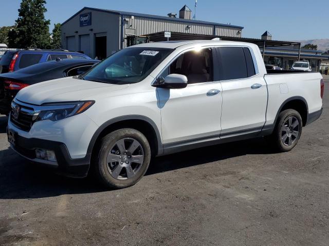 Photo 1 from auction – 2020 HONDA RIDGELINE with VIN 5FPYK3F75LB005033