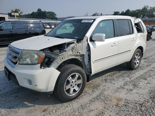 HONDA PILOT TOUR 2011 with VIN 5FNYF3H9XBB021044 - Photo from auction