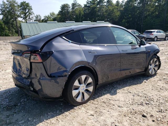 Photo 3 from auction – 2023 TESLA MODEL Y with VIN 7SAYGDEE3PA117111