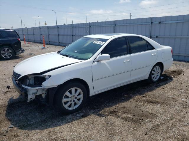 TOYOTA CAMRY LE 2004 with VIN 4T1BF30K54U075510 - Photo from auction