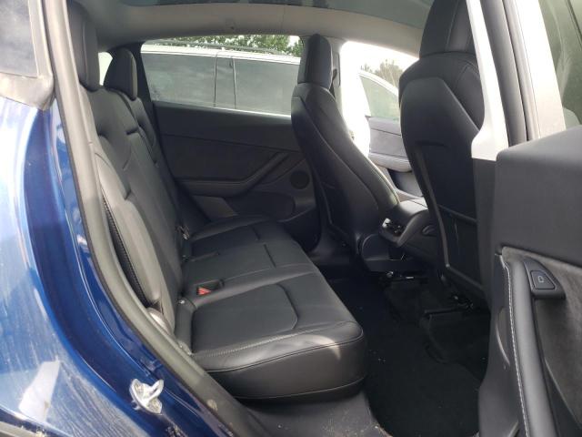 Photo 11 from auction – 2022 TESLA MODEL Y with VIN 7SAYGDEE2NF428254