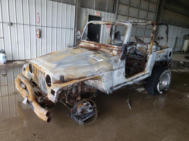 JEEP WRANGLER / 2000 with VIN 1J4FA59S6YP792712 - Photo from auction
