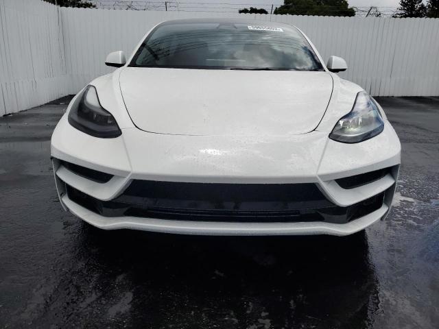 Photo 5 from auction – 2021 TESLA MODEL 3 with VIN 5YJ3E1EA1MF085752