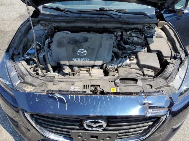 Photo 11 from auction – 2018 MAZDA 3 TOURING with VIN 3MZBN1L34JM274867