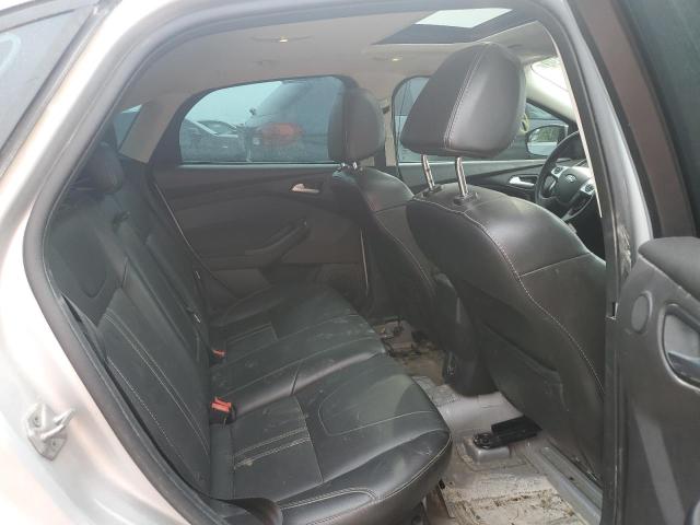 Photo 10 from auction – 2013 FORD FOCUS TITA with VIN 1FADP3J20DL375752