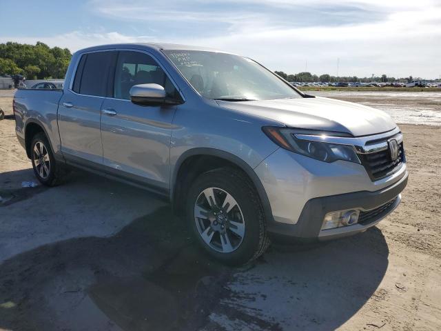 Photo 4 from auction – 2018 HONDA RIDGELINE with VIN 5FPYK3F76JB017530