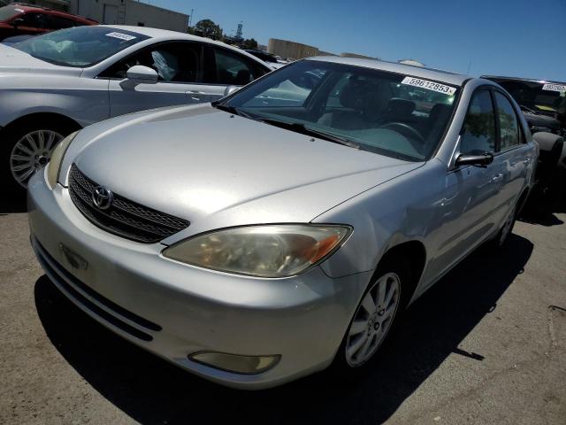 TOYOTA CAMRY LE 2004 with VIN 4T1BF30K84U583468 - Photo from auction