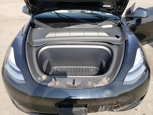 Photo 11 from auction – 2023 TESLA MODEL Y with VIN 7SAYGDEE1PA118516