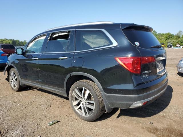 Photo 2 from auction – 2018 HONDA PILOT TOUR with VIN 5FNYF6H98JB009409