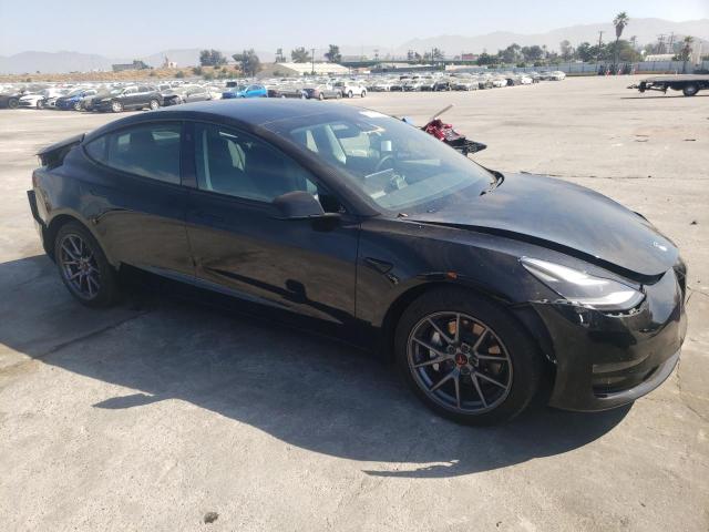 Photo 4 from auction – 2021 TESLA MODEL 3 with VIN 5YJ3E1EBXMF003672