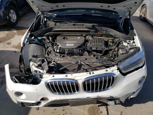 Photo 11 from auction – 2017 BMW X1 XDRIVE2 with VIN WBXHT3C32H5F83452