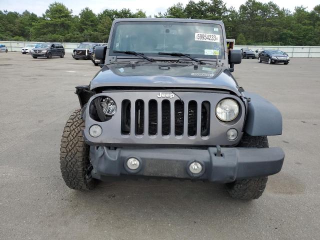 Photo 5 from auction – 2014 JEEP WRANGLER U with VIN 1C4BJWDG7EL270123