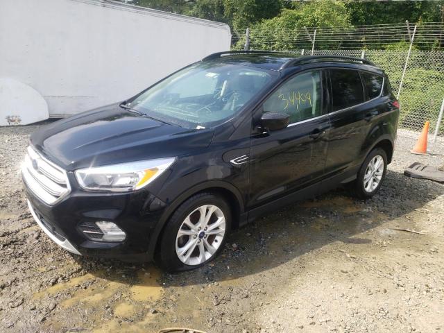 FORD ESCAPE SE 2018 with VIN 1FMCU0GD7JUB70677 - Photo from auction