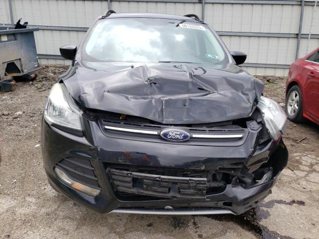 Photo 5 from auction – 2016 FORD ESCAPE SE with VIN 1FMCU9G99GUB63545
