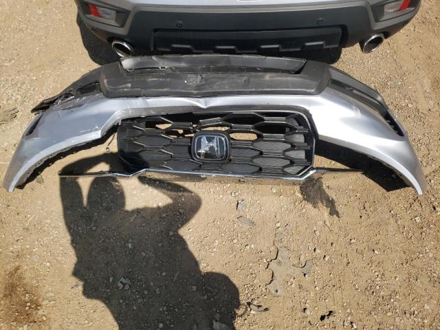 Photo 12 from auction – 2022 HONDA PASSPORT E with VIN 5FNYF8H58NB030825