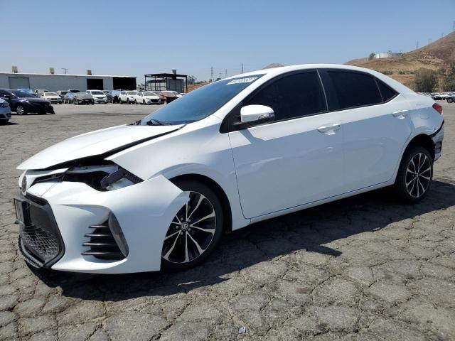 TOYOTA COROLLA L 2018 with VIN 5YFBURHE1JP822296 - Photo from auction