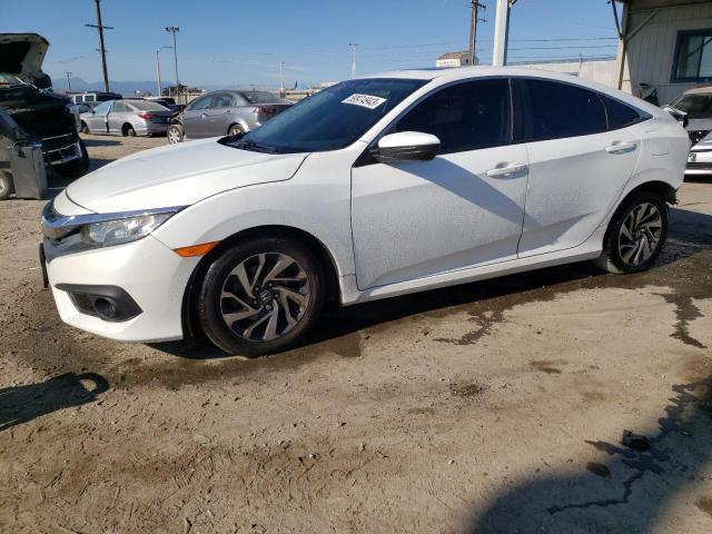 HONDA CIVIC EX 2018 with VIN 2HGFC2F81JH526114 - Photo from auction