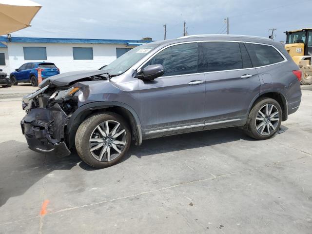 HONDA PILOT ELIT 2021 with VIN 5FNYF6H07MB088836 - Photo from auction