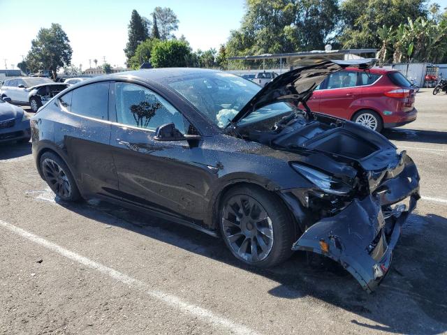 Photo 4 from auction – 2023 TESLA MODEL Y with VIN 7SAYGDEE2PA134952