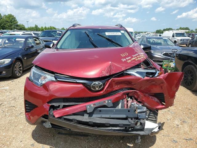 Photo 5 from auction – 2018 TOYOTA RAV4 LE with VIN JTMZFREV9JD112885