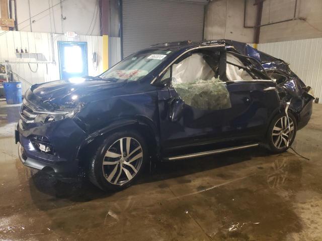 HONDA PILOT TOUR 2018 with VIN 5FNYF6H94JB062785 - Photo from auction